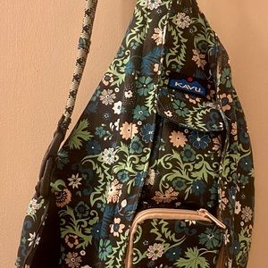 SOLD! A like new, full sized flower KAVU sling bag